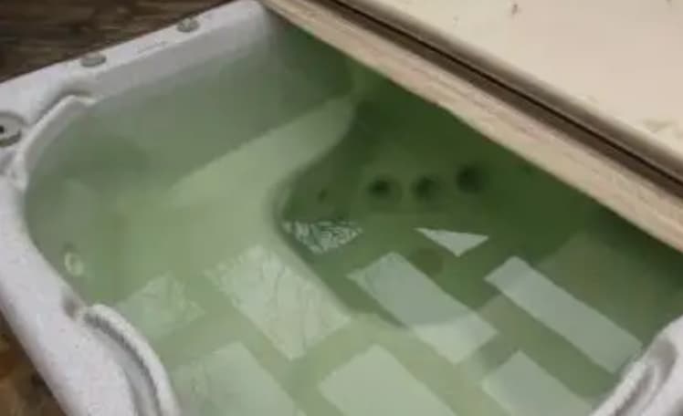how to fix green hot tub water